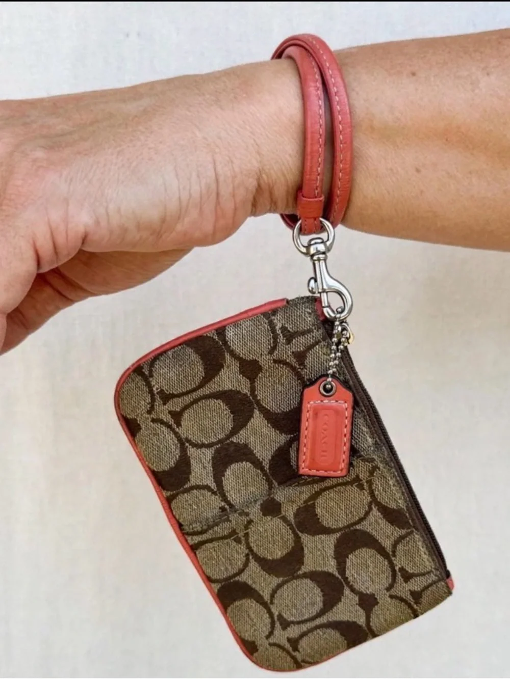 Coach Brown Signature Canvas Wristlet with Coral Trim